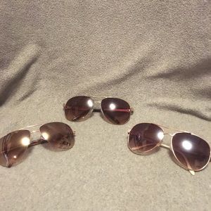 3 pair of sunglasses